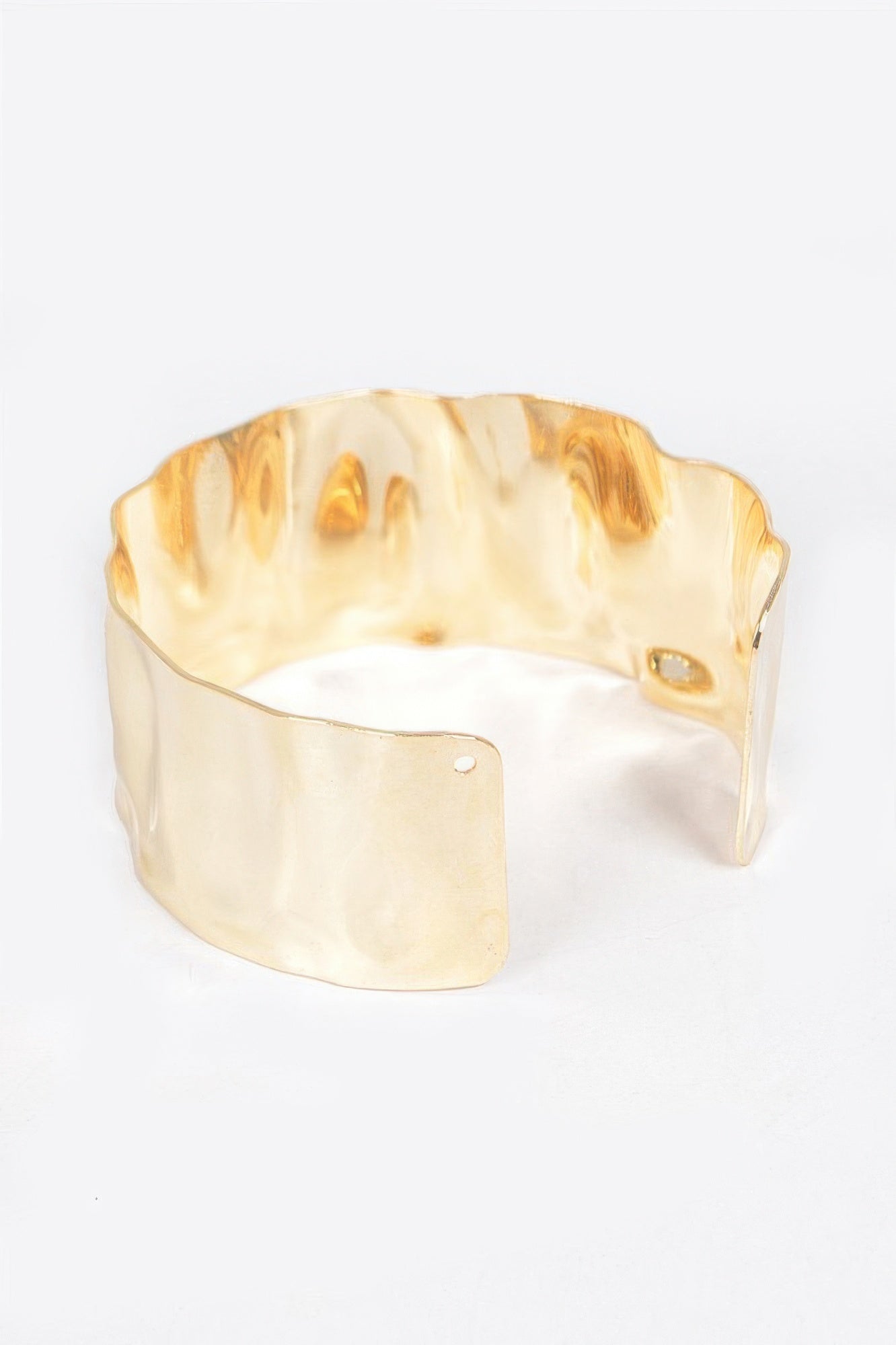 Gold metal cuff bracelet, smooth wide band with open center and side rivet