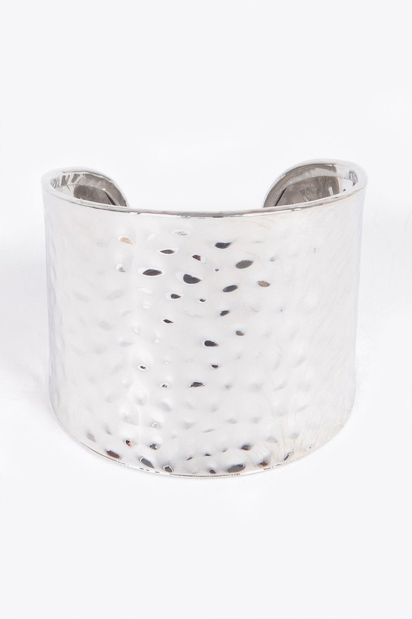 Silver metal cuff: wide cuff with hammered texture and dark dot cutouts