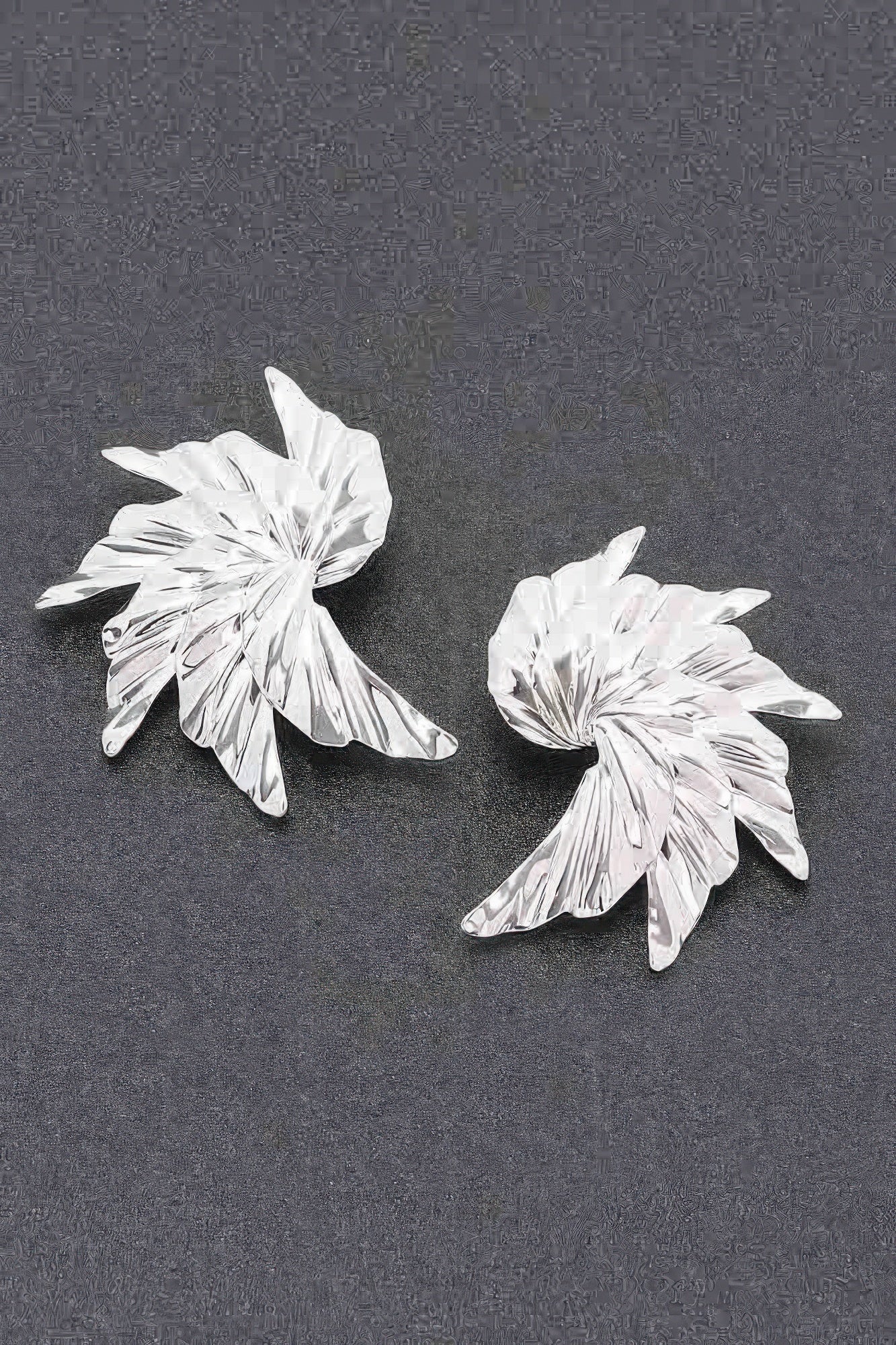Silver-tone floral metal earrings with ridged petal-style flower