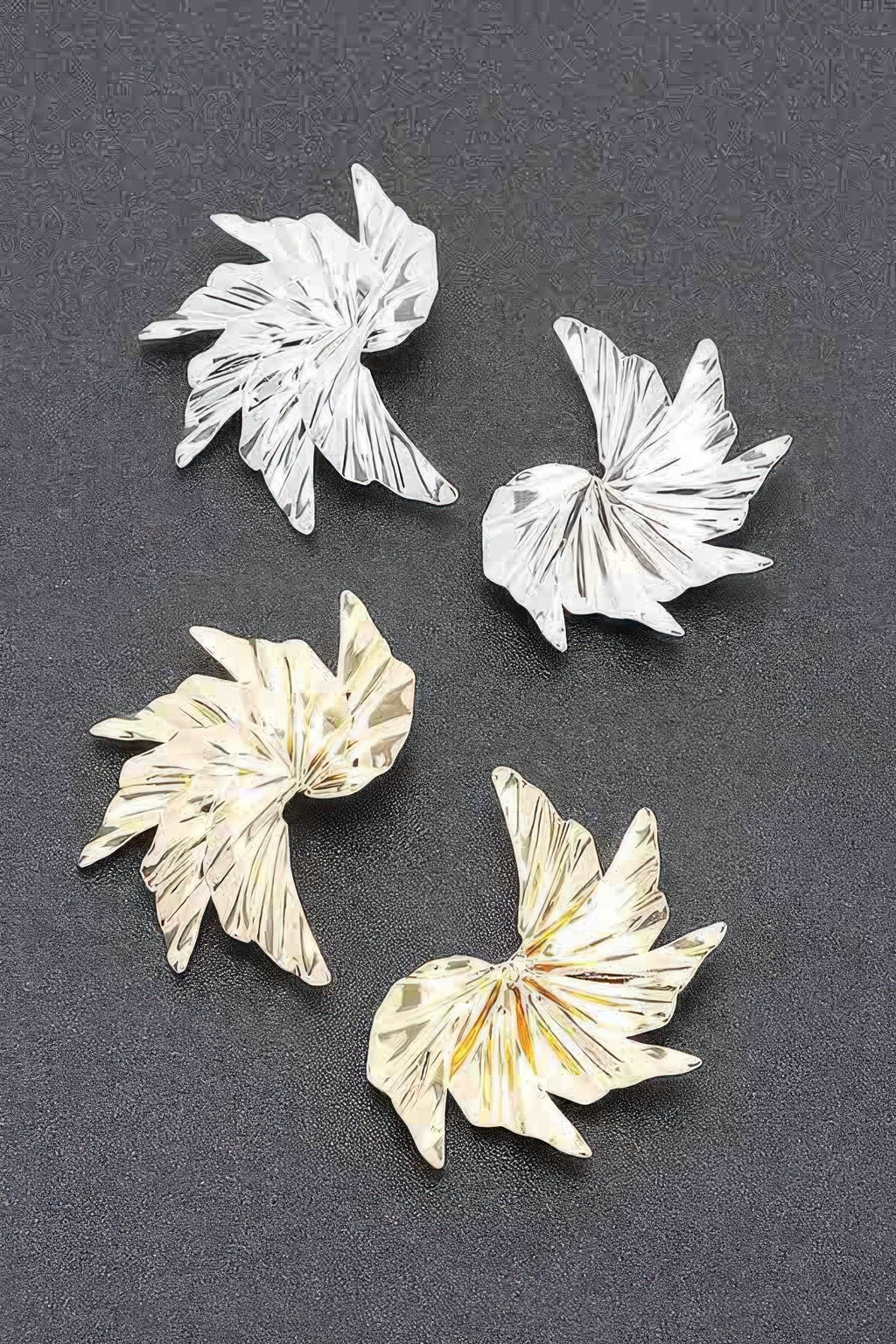 Set of silver- and gold-tone floral metal earrings with ridged petals