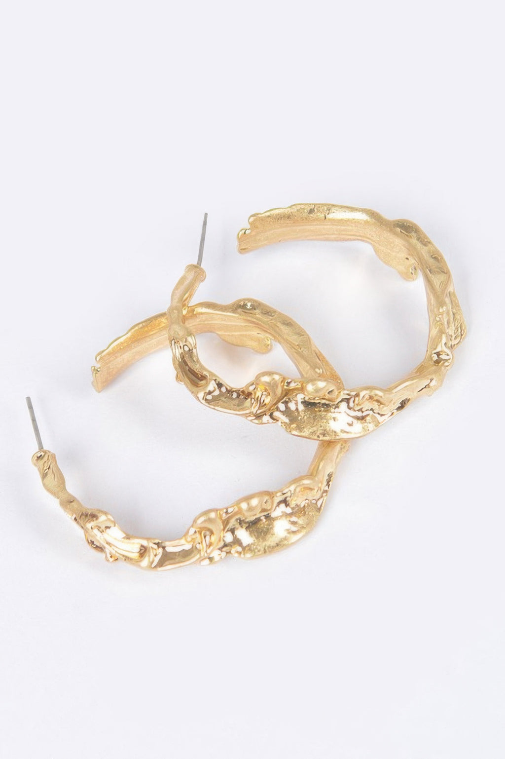 Gold metal hoop earrings with wavy textured surface and visible stud backs