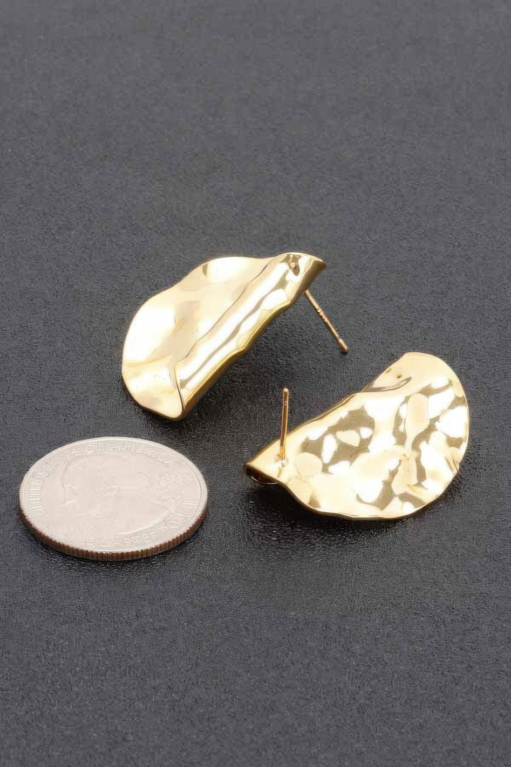 Gold dip metal earrings, hammered teardrop shape with stud posts; scale coin shown
