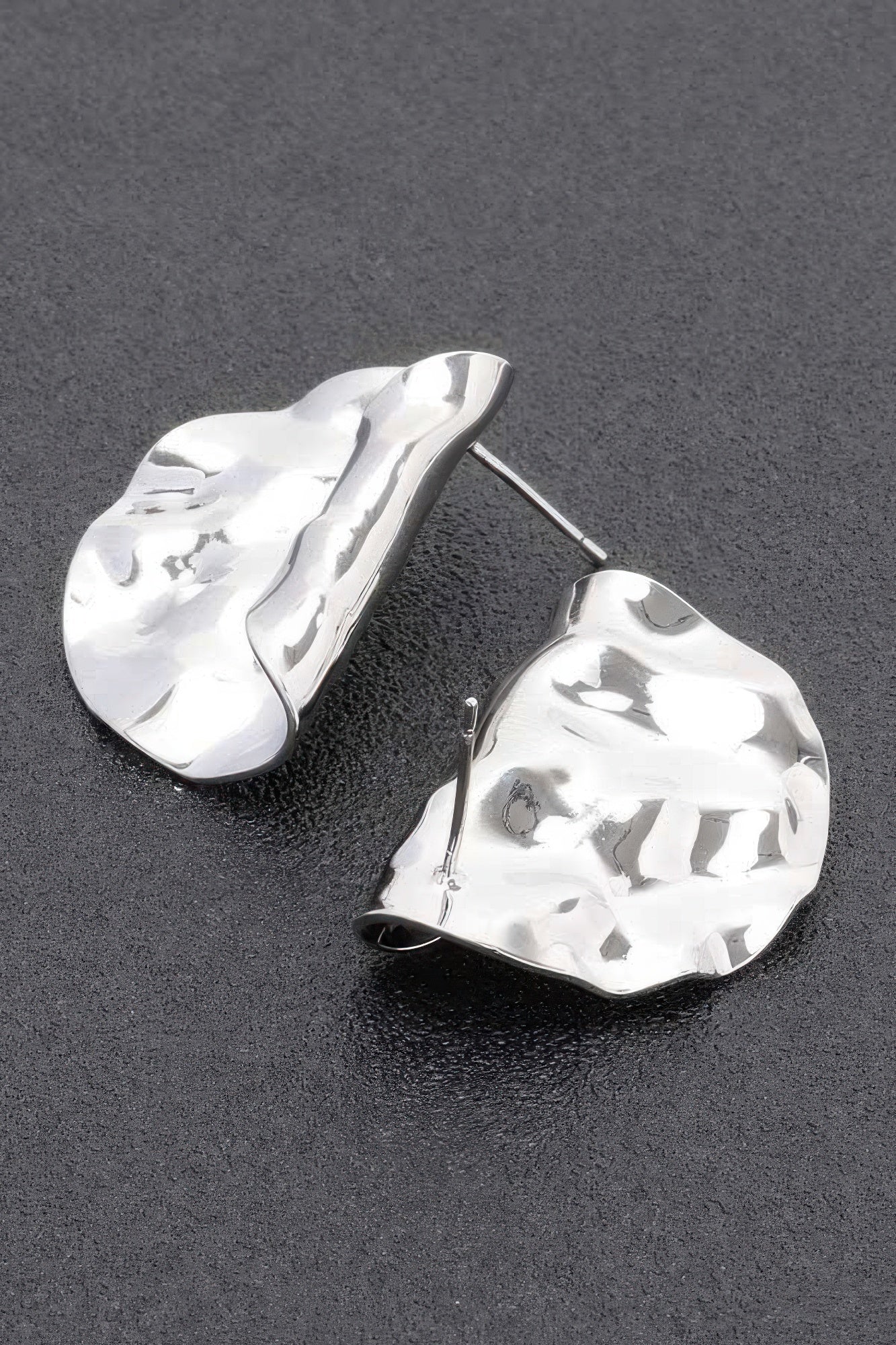 Silver dip metal earrings, hammered teardrop shape with straight posts and backings