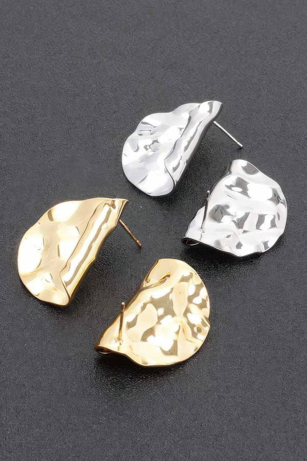Metal dip earrings in gold and silver, hammered teardrop shapes with stud posts