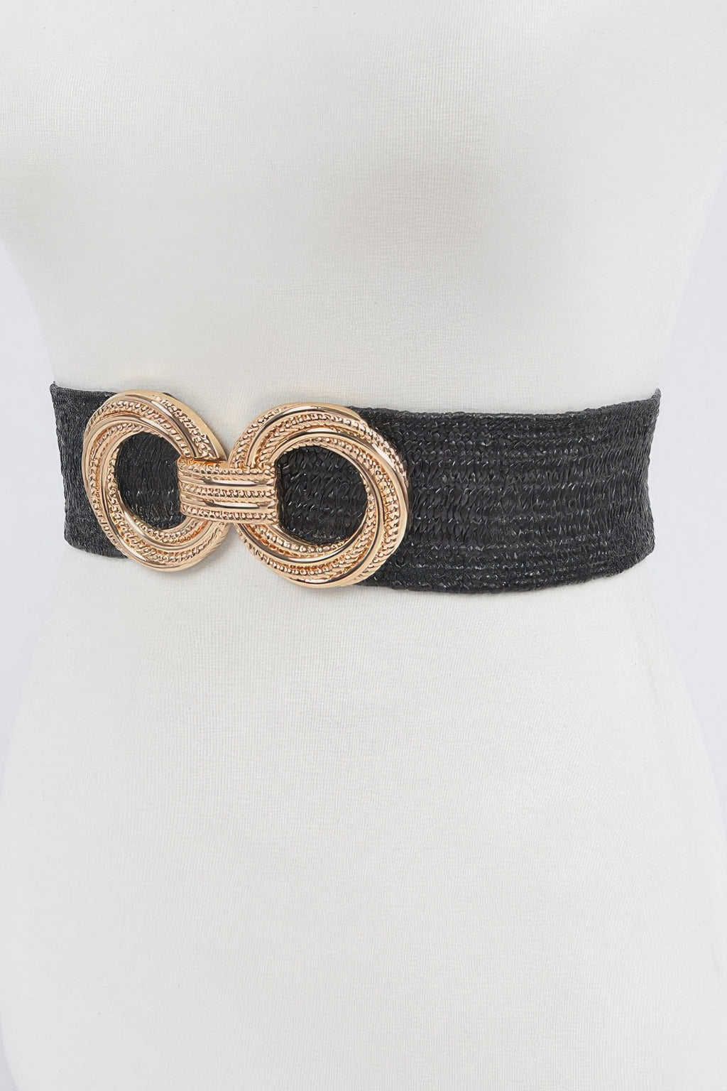 Black stretch straw belt with gold-tone oval buckle featuring dark insets
