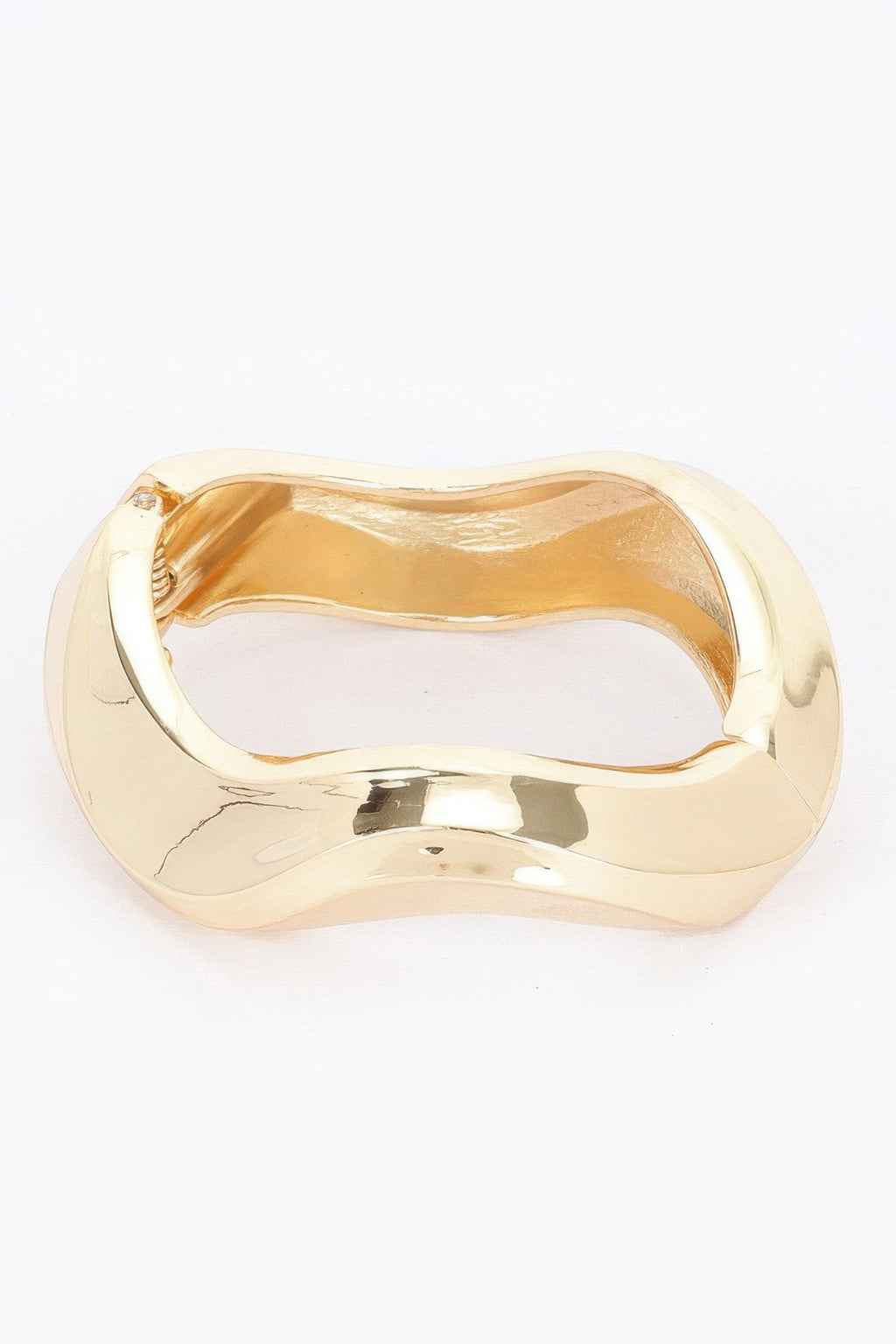 Gold metal spring hinge bracelet with polished cuff loop