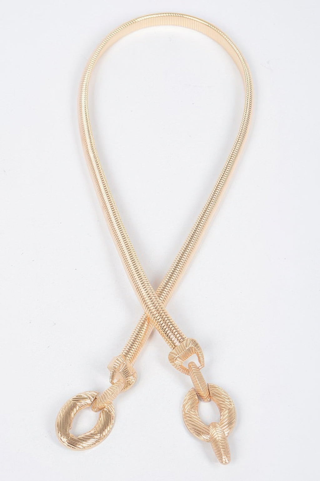 Metal stretch belt with teardrop loop and gold-tone oval links