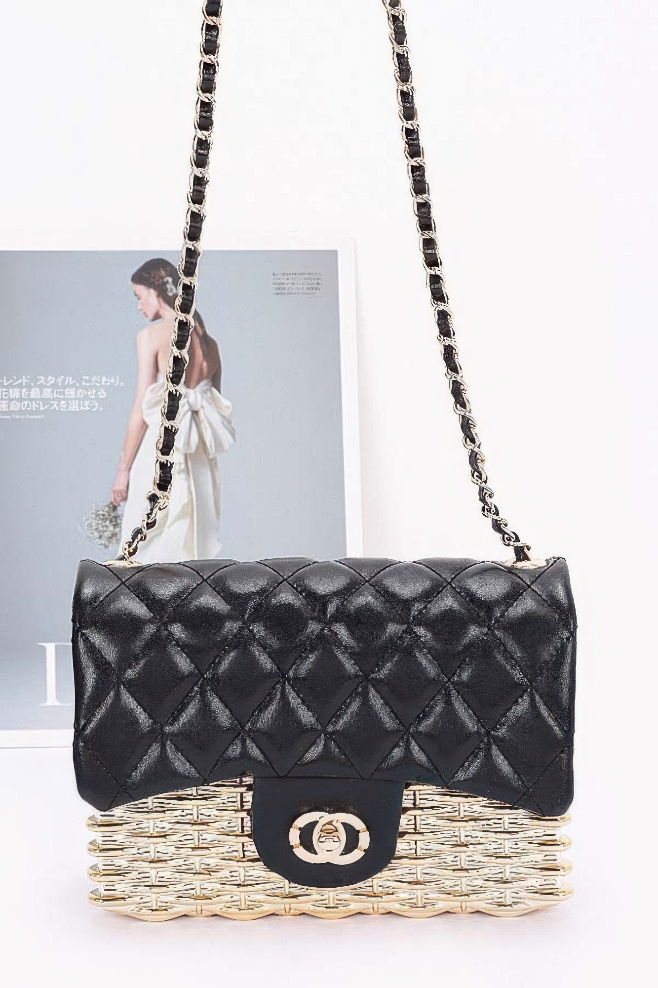 Metallic Acrylic Flap Bag with quilted black front, chain strap, gold-toned woven base