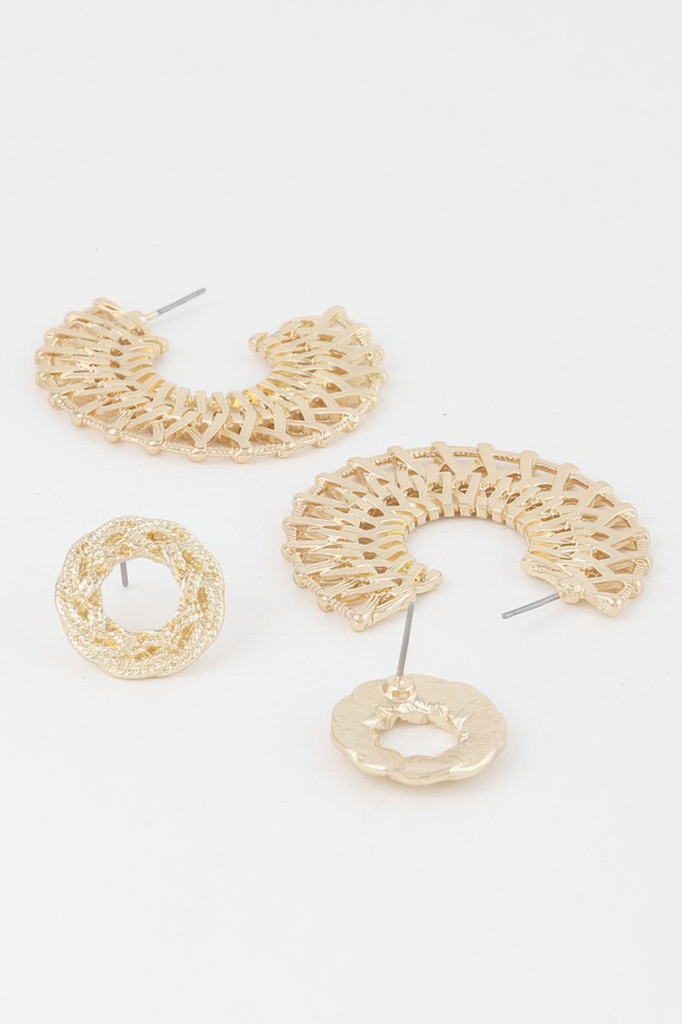 Gold braided hoop earrings with circular lattice pattern and hoop backs