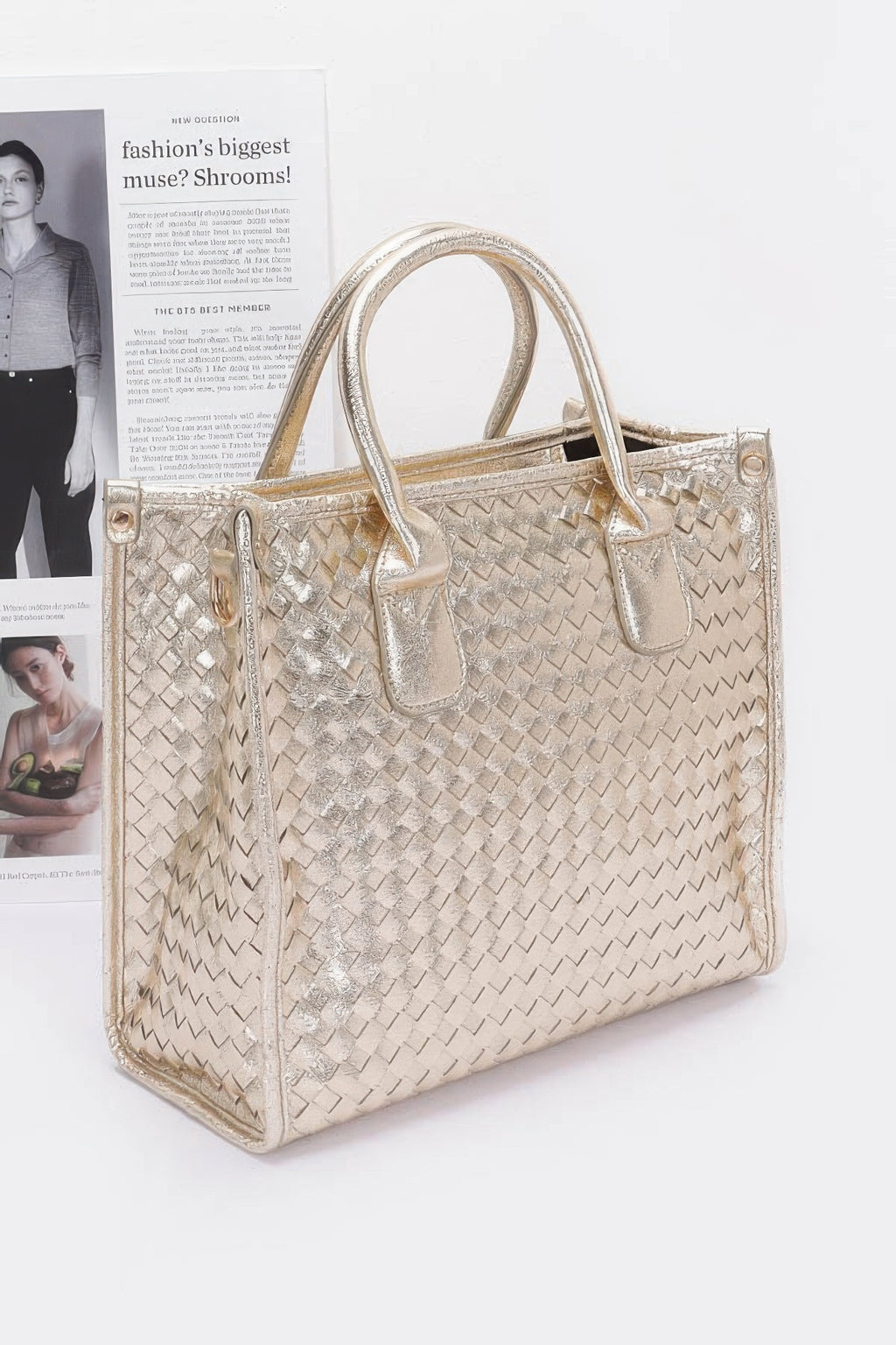 Metallic braided tote bag in gold with adjustable shoulder strap and top handles