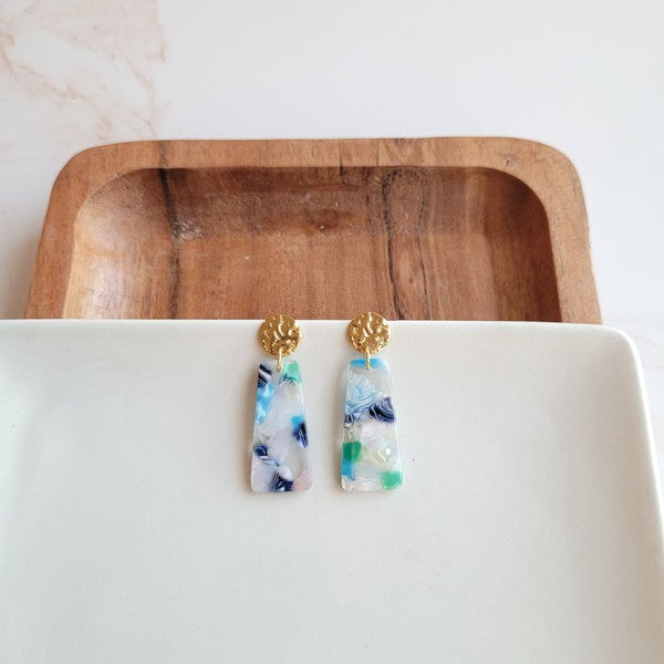 Mini dangle earrings with gold tops and blue-green marbled acrylic rectangles