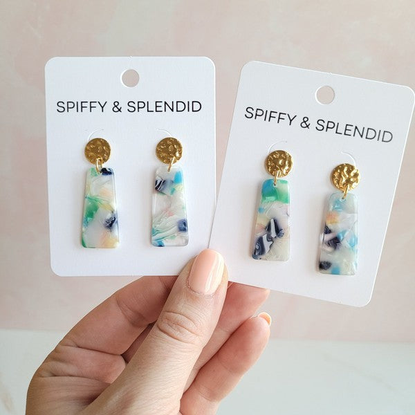 Earrings on cards: gold round tops with blue-green swirled acrylic rectangle dangles