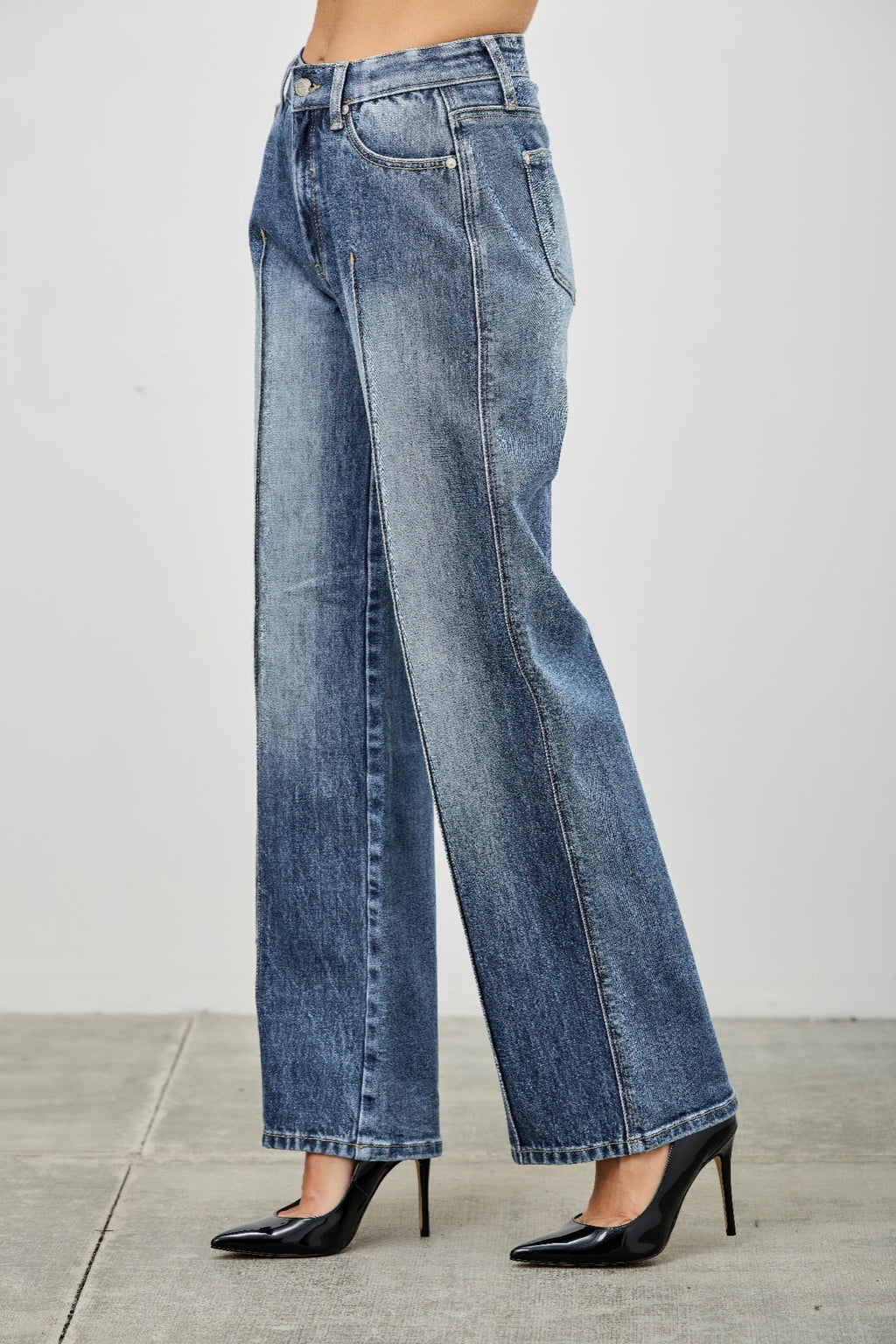 Side view of mid-rise straight jeans with pintuck seams, light blue denim