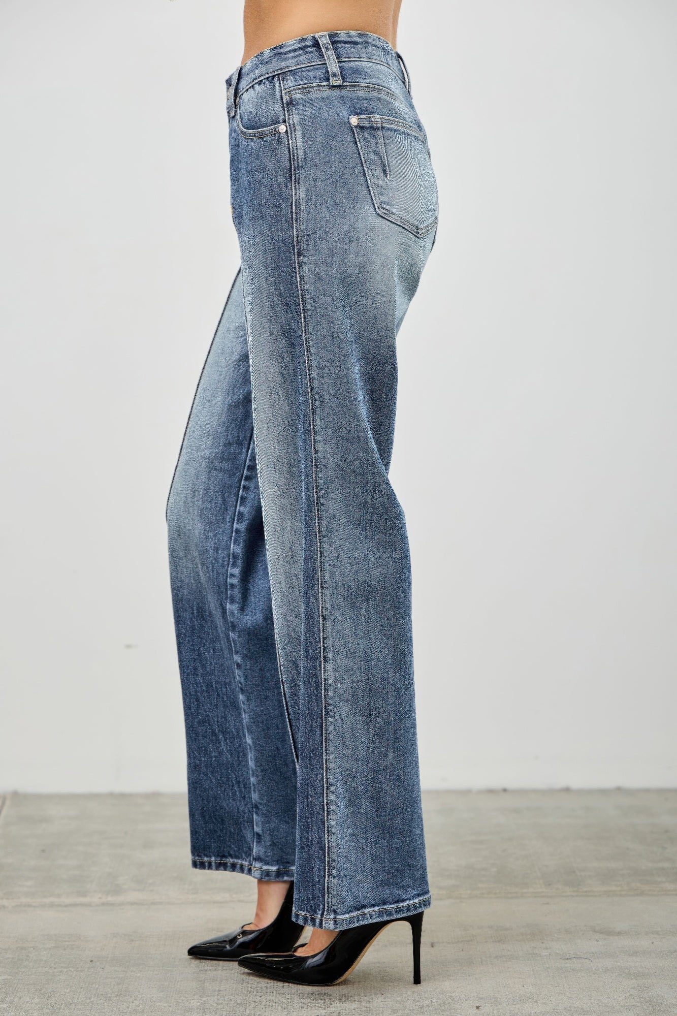 Blue mid-rise straight jeans with center pintuck seam and back patch pockets