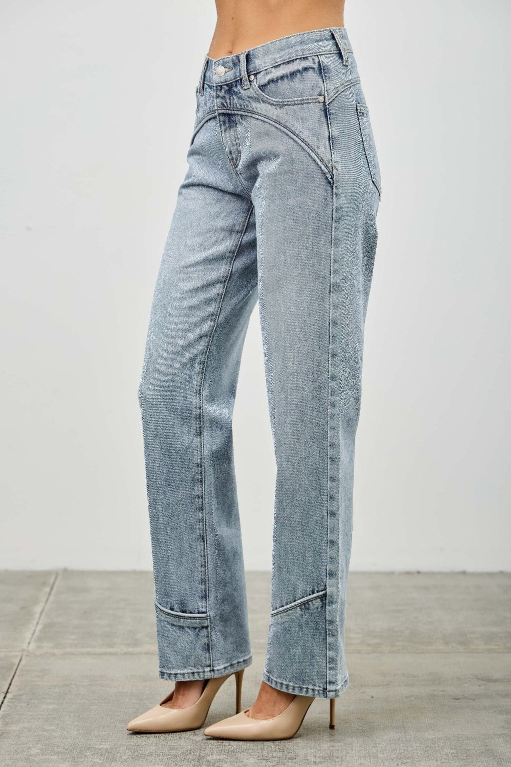 Mid-rise straight jeans with contrast piping, light-wash blue denim, side seam view