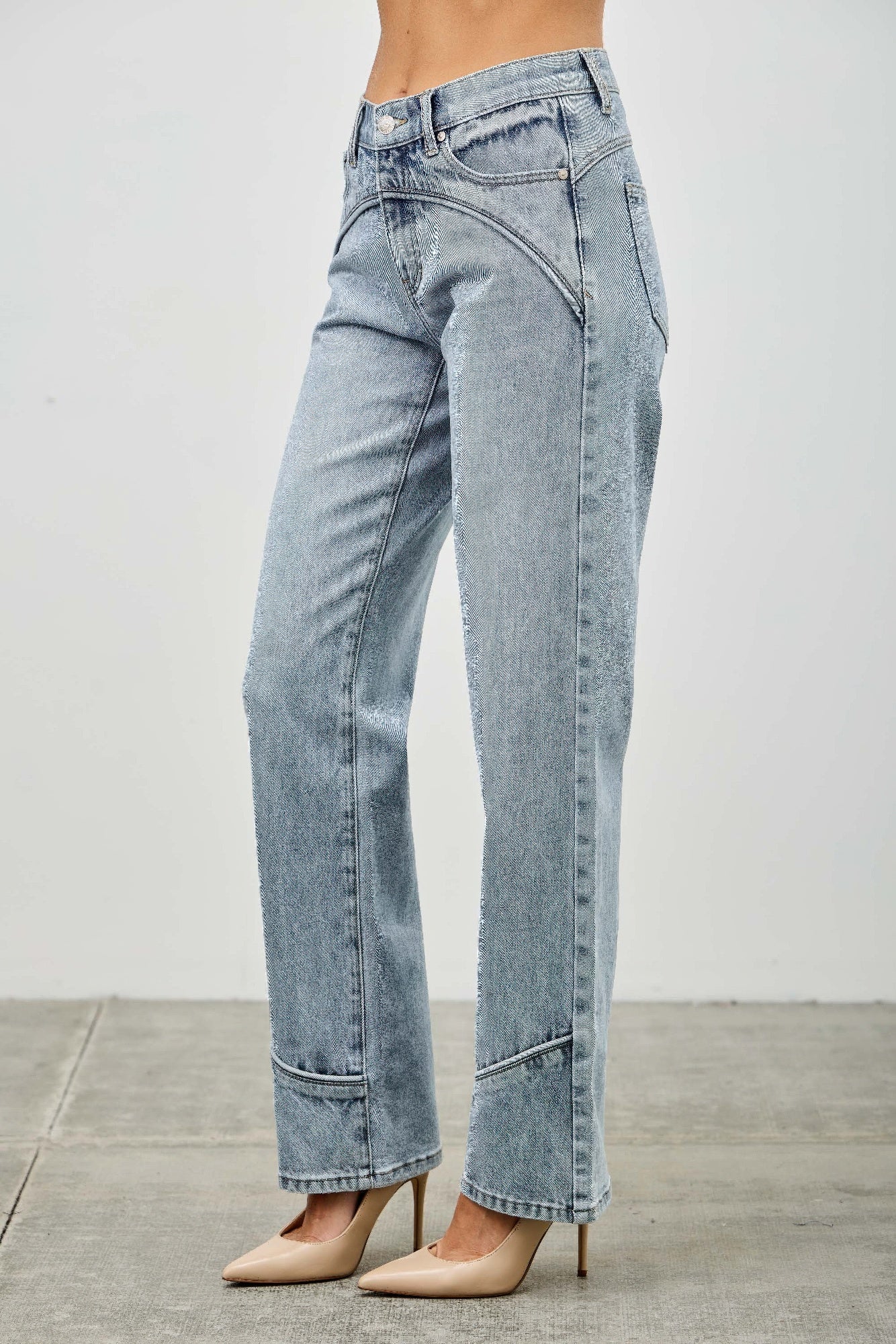 Mid-rise straight jeans with contrast piping, light-wash blue denim, side seam view