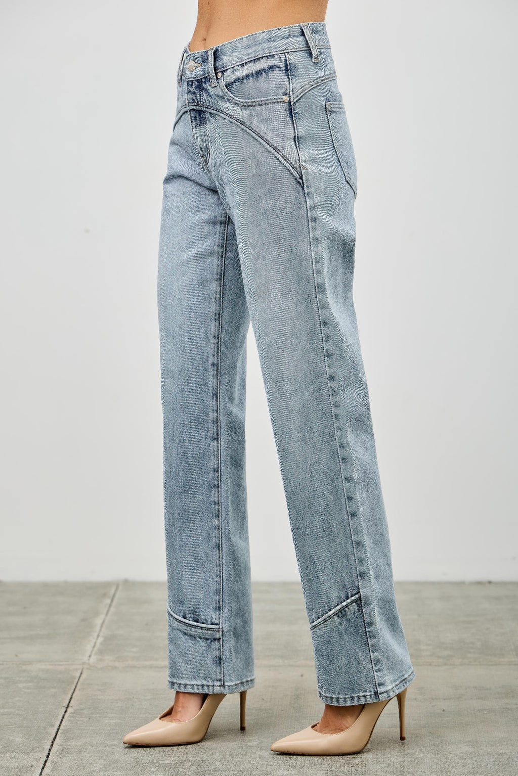Mid-rise straight jeans with piping, light-wash denim back view with wide leg