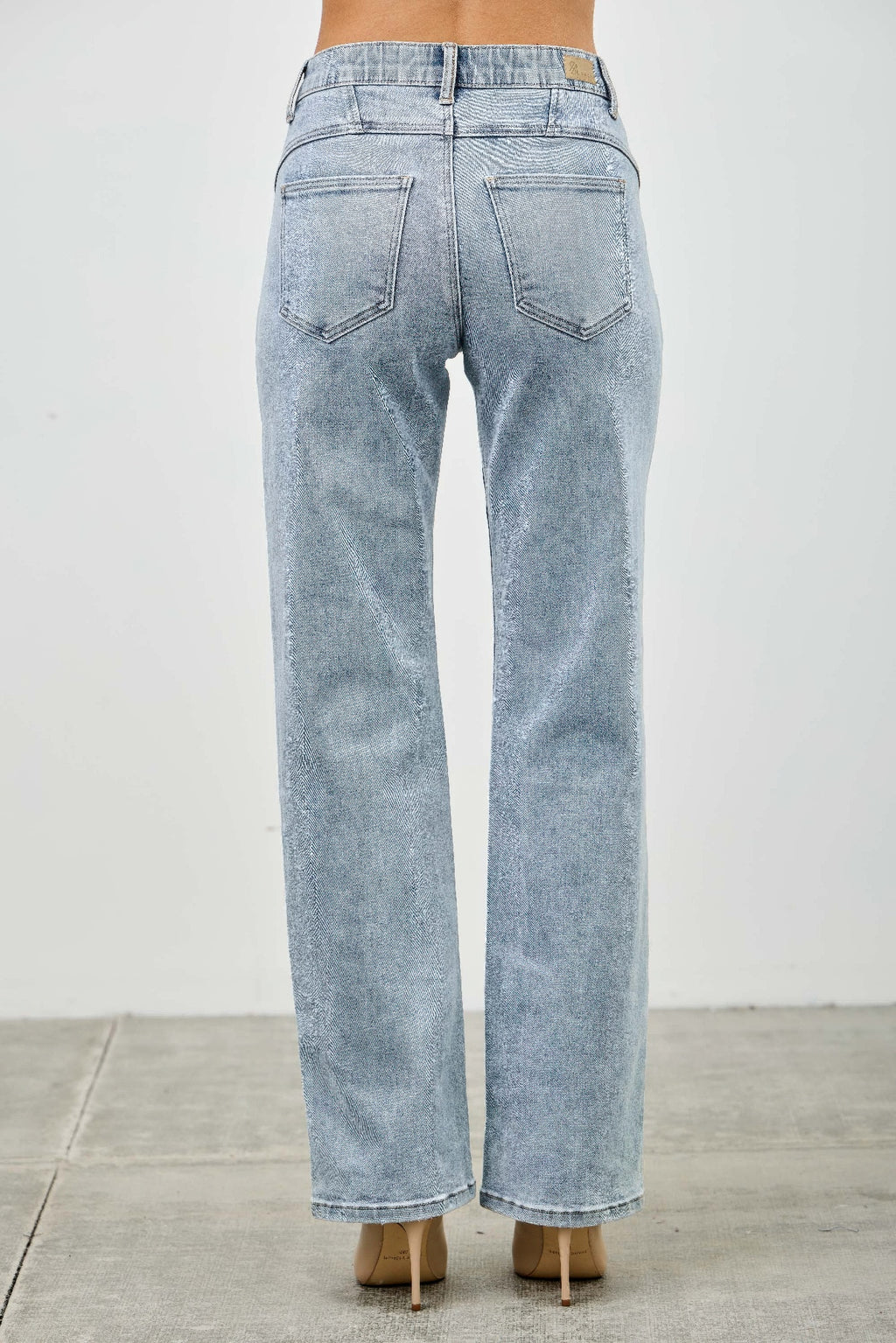 Mid-rise straight jeans with piping, light-wash denim back view with two pockets