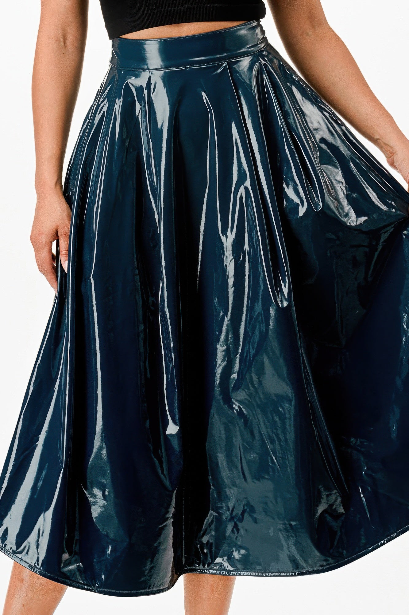 Close-up: glossy teal midi skirt with pleated, wide A-line