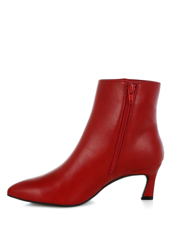 Red ankle boots with side zipper detail and mid-height block heel
