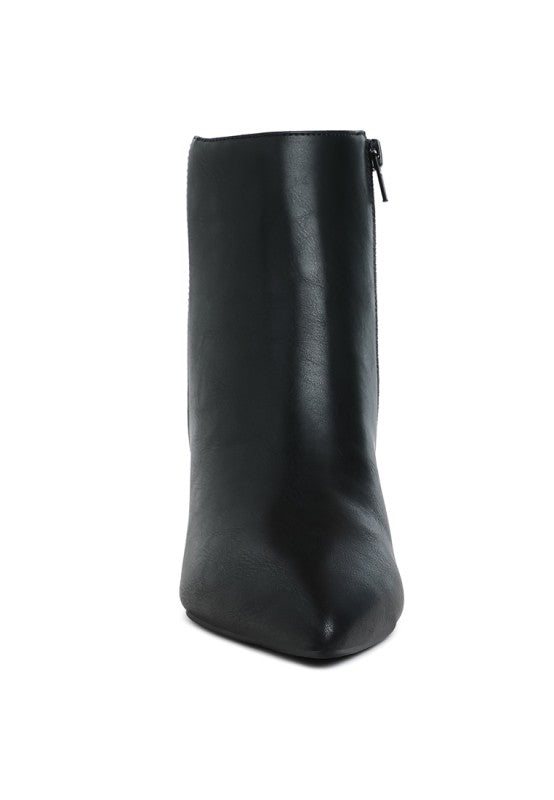 Black faux leather ankle boots from back with pull-tab and zipper top