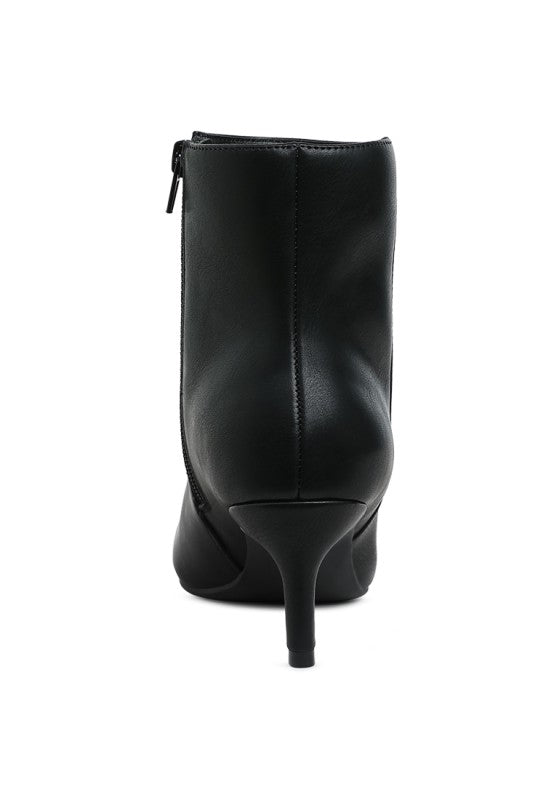 Black ankle boots back view with slim heel and zipper closure