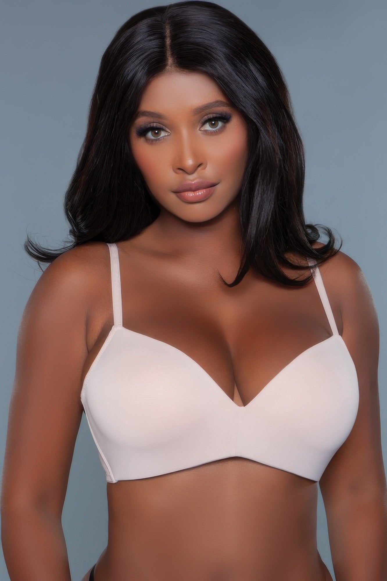 Nude-colored V-neck bra with thin adjustable straps, front view