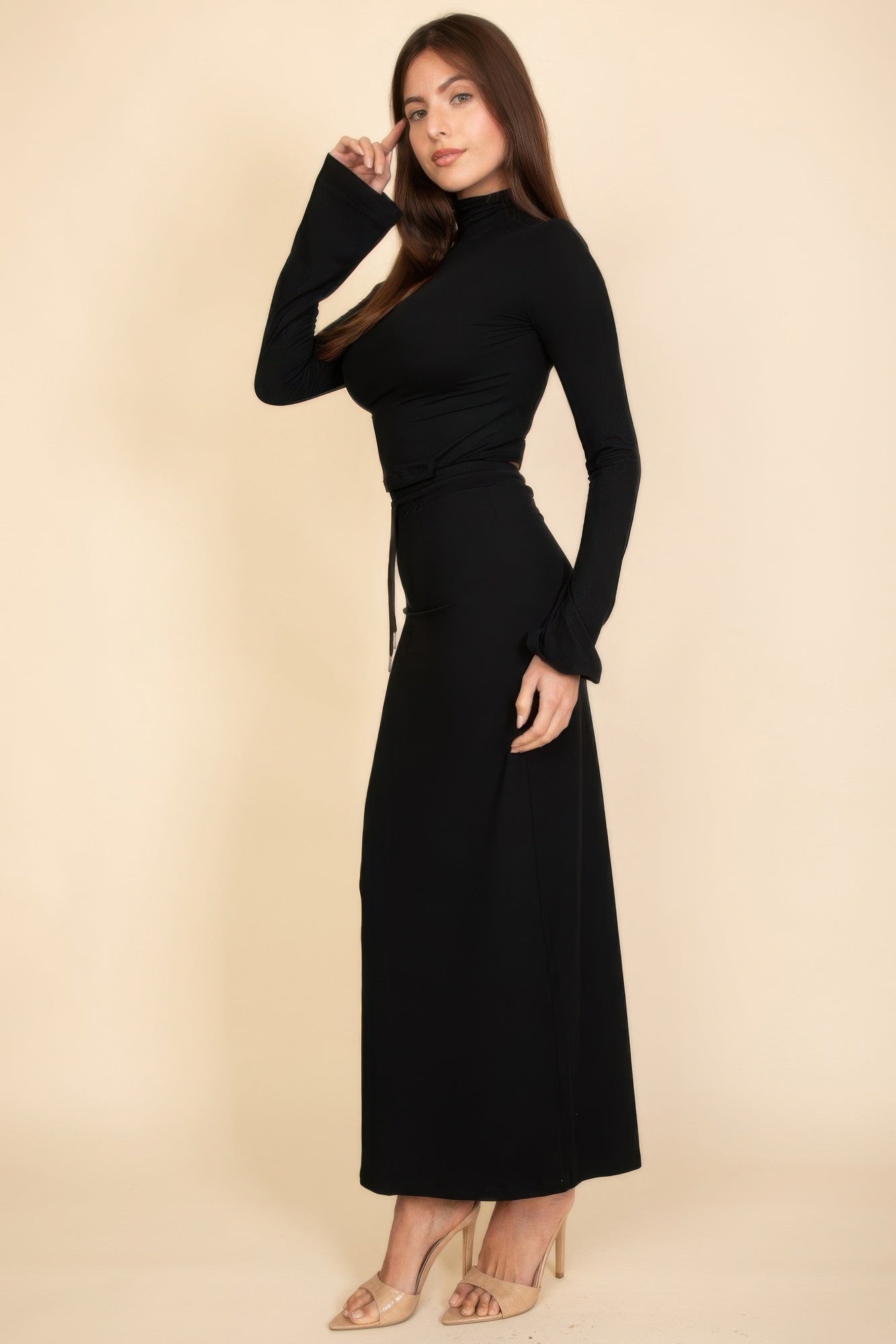 Black two-piece set: mock-neck crop top and high-waist maxi skirt