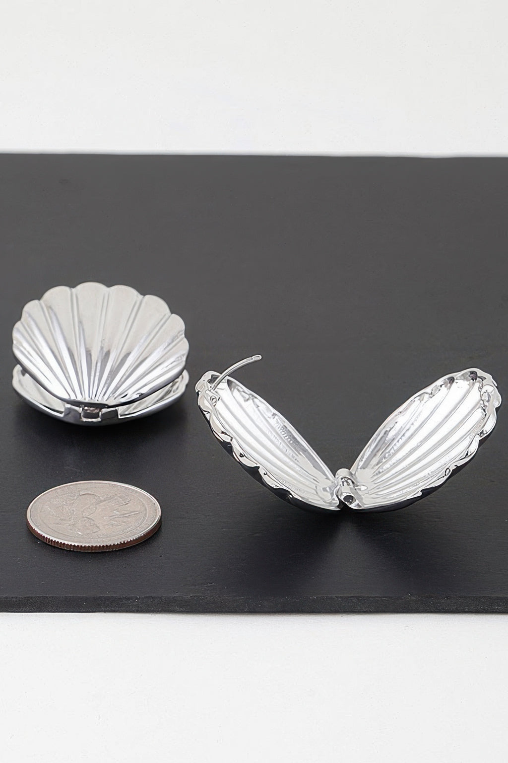 Modern clam shell earrings, silver-tone ridged shells with clasp backing
