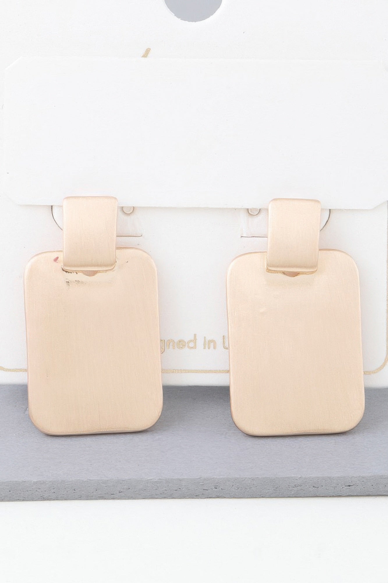 Gold flat cubic drop earrings with square top and rounded rectangle dangle, pair