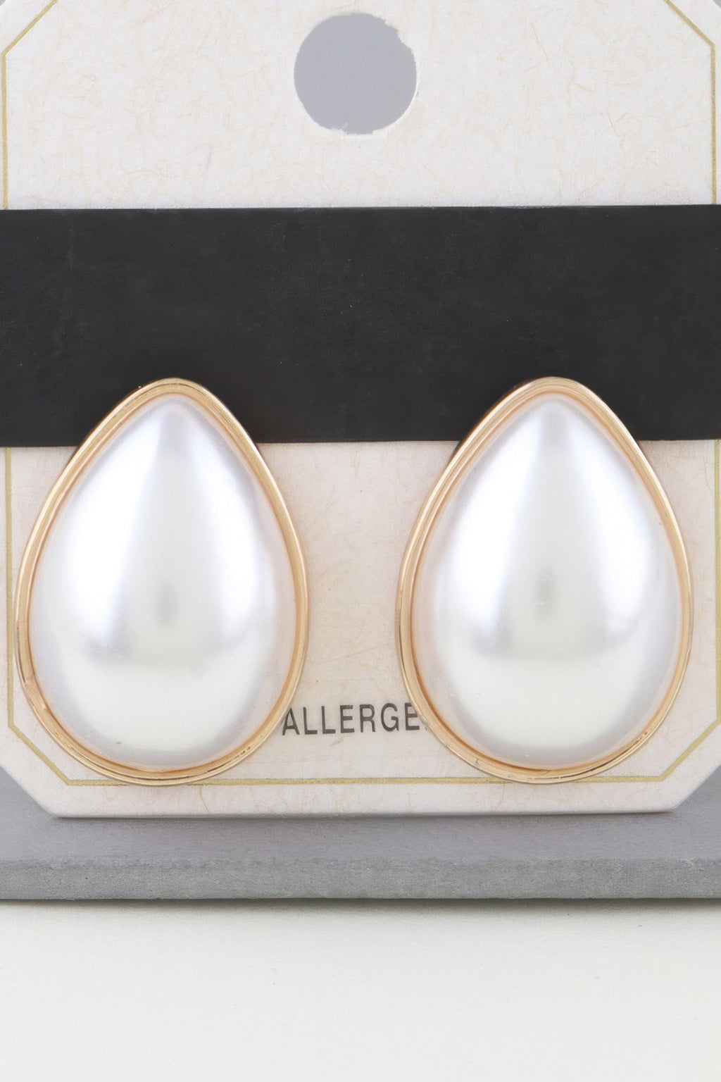 Modest Pearl Teardrop Earrings in gold cream, teardrop pearl front view