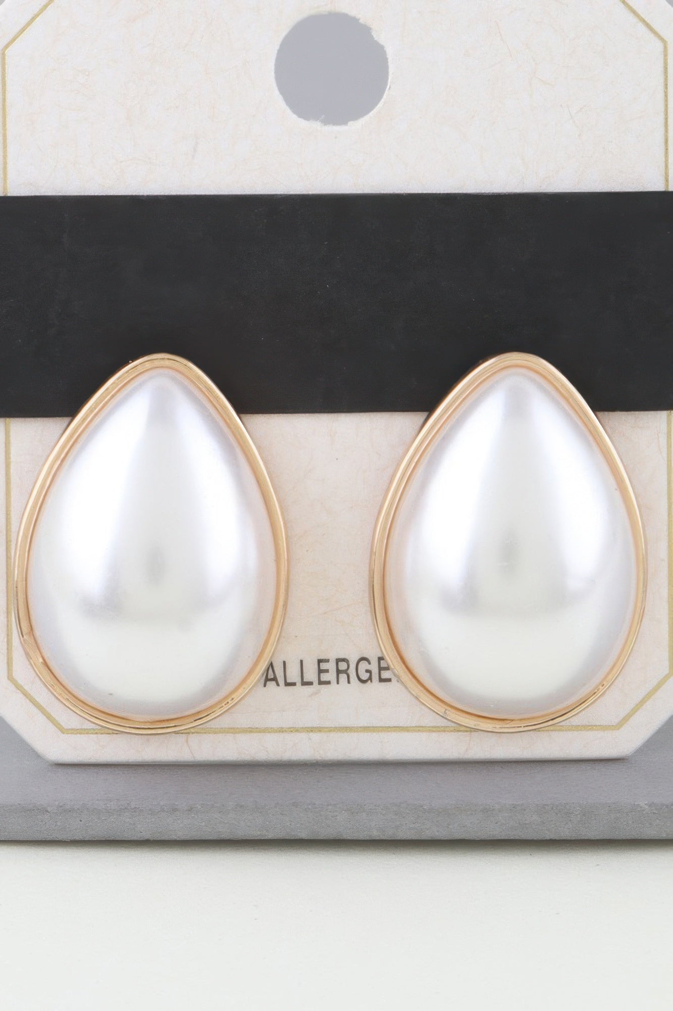 Modest Pearl Teardrop Earrings in gold cream, teardrop pearl front view