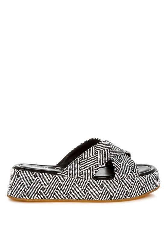 Raffia Flatform Slip Ons, schwarz-weißes Muster, breite Plateaubasis mit Riemen