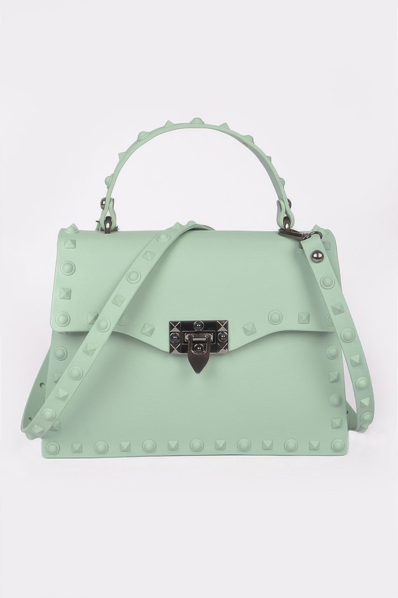 Monotone studded clutch in mint green with black gem-lock clasp and studded crossbody strap
