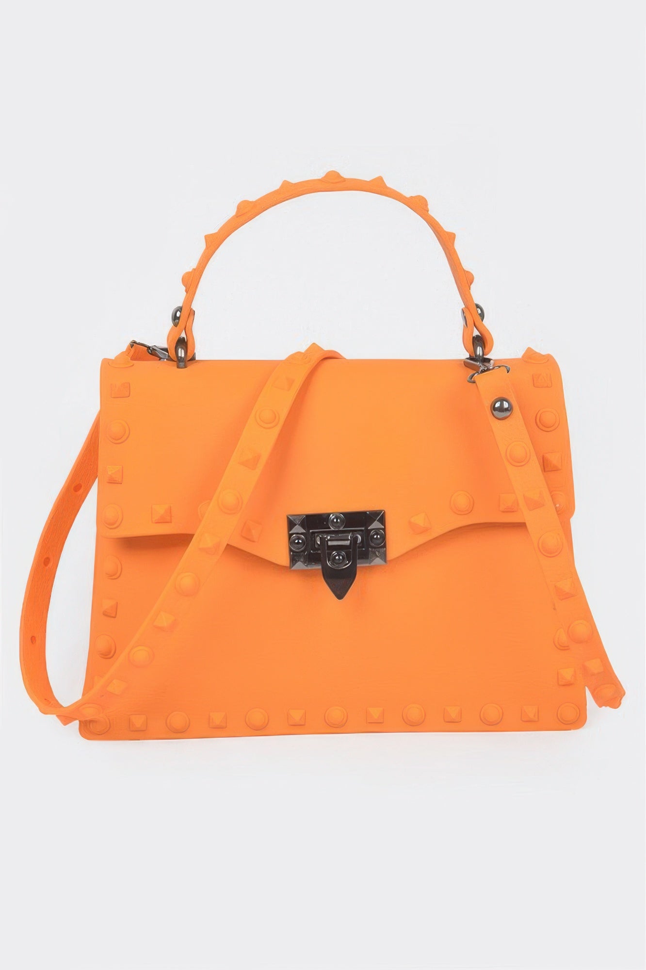 Monotone studded clutch in orange with black gem-lock clasp and long shoulder strap