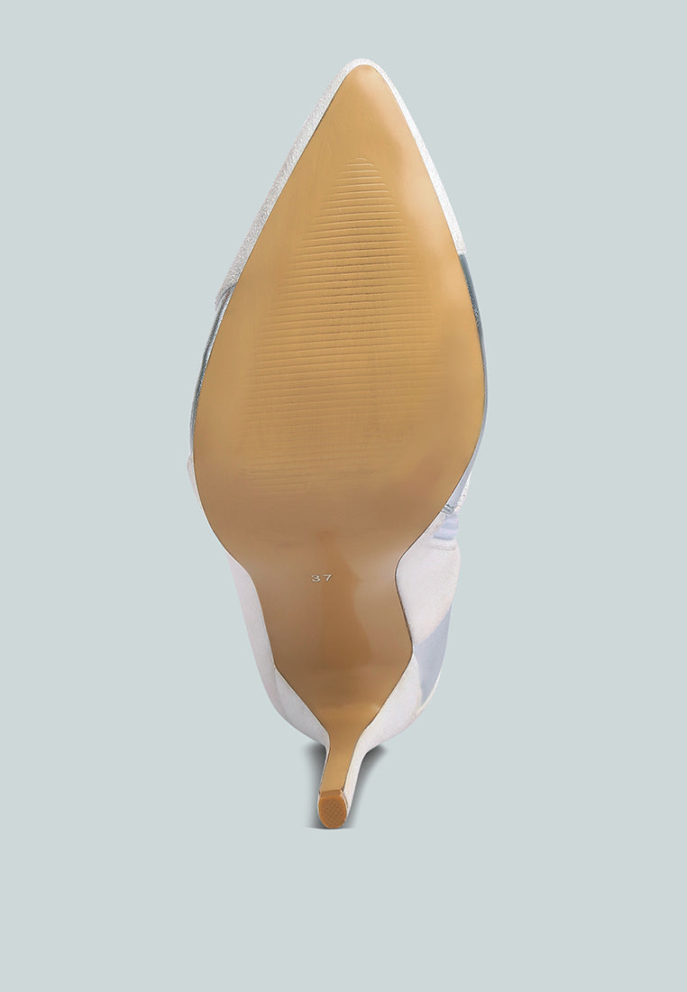White stiletto heel boot with pointed toe, underside view