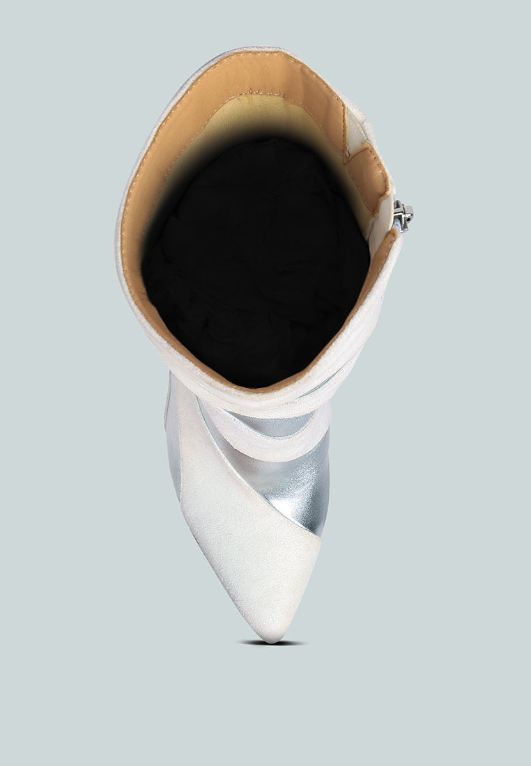 White pointed-toe stiletto boot with open interior and metallic strap accents