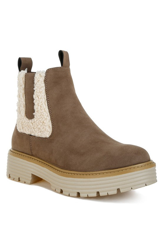 Taupe chunky ankle boots with cream faux fur panel and thick platform outsole