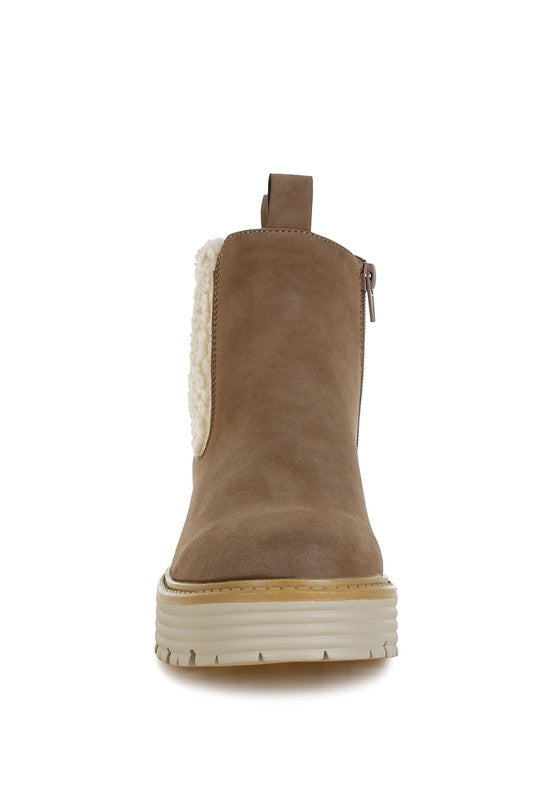 Taupe ankle boot rear view, faux fur trim at collar, thick sole
