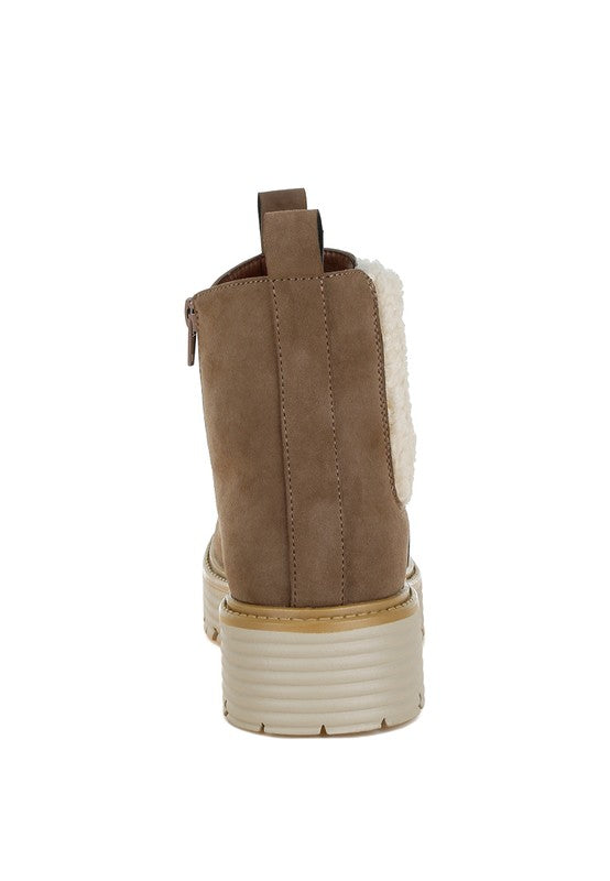 Taupe ankle boot side view with faux fur panel and heel-toe chunky sole