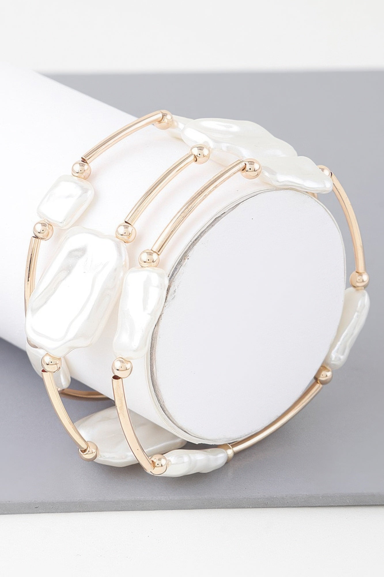 Multi-Abstract pearl stone tube bracelet, gold-tone with white baroque stones