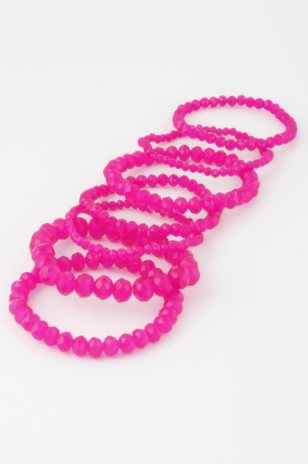 Multi crystal beaded bracelet strands in bright fuchsia, stacked loop view