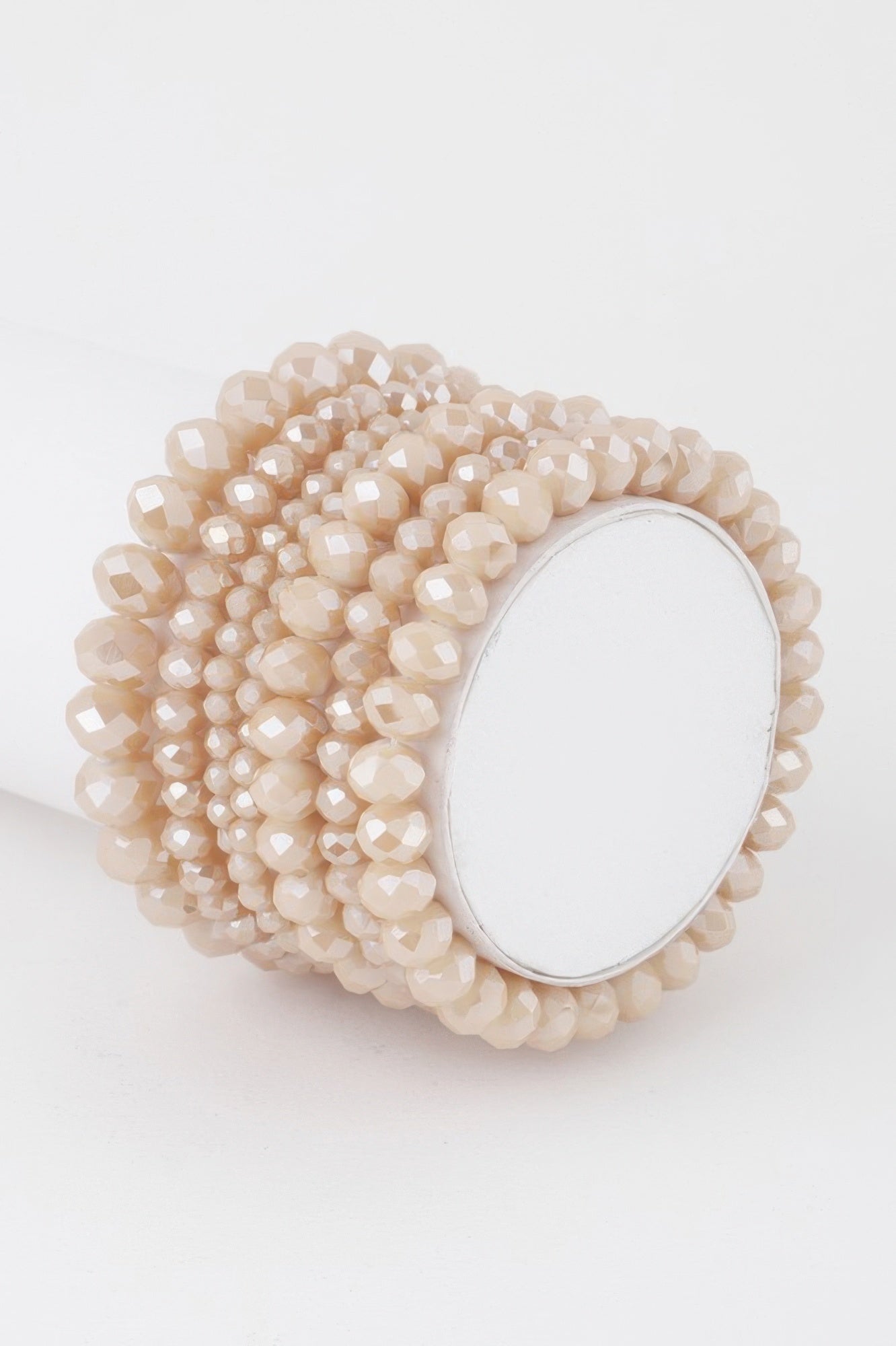 Multi crystal beaded bracelet in beige/cream with oval clasp detail