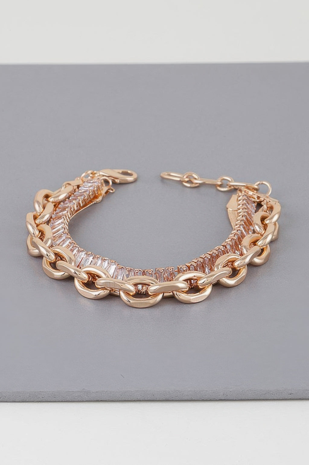 Gold Clear multi-crystal bracelet with curb links and a row of clear crystals