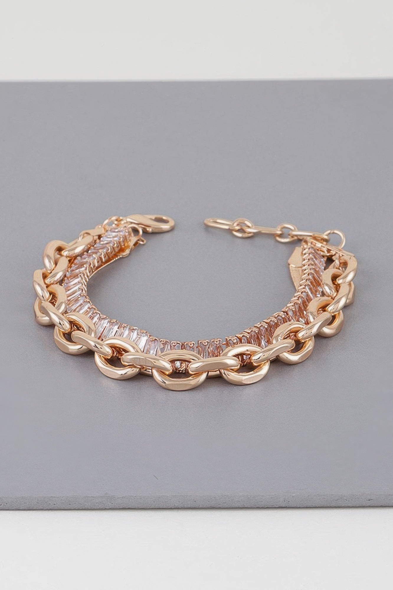 Gold Clear multi-crystal bracelet with curb links and a row of clear crystals
