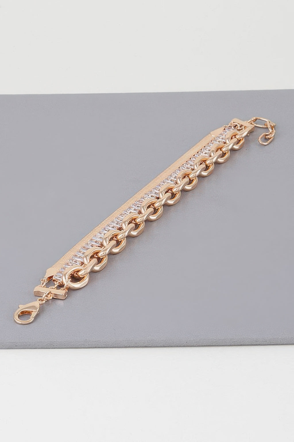 Gold Clear bracelet with lobster clasp, curb links and clear baguette crystal row