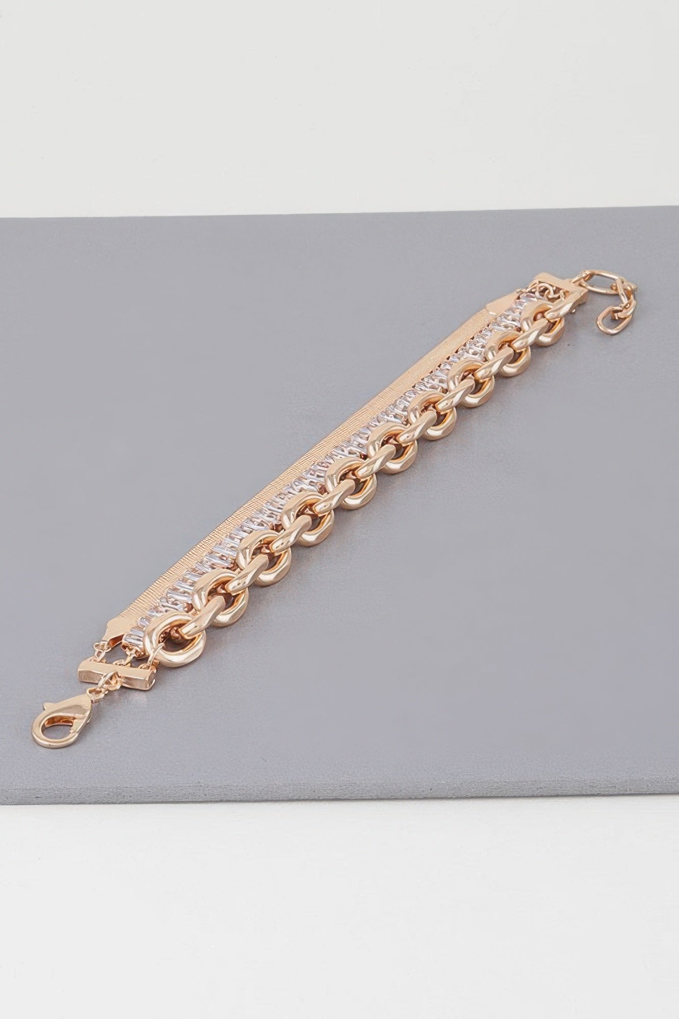 Gold Clear bracelet with lobster clasp, curb links and clear baguette crystal row