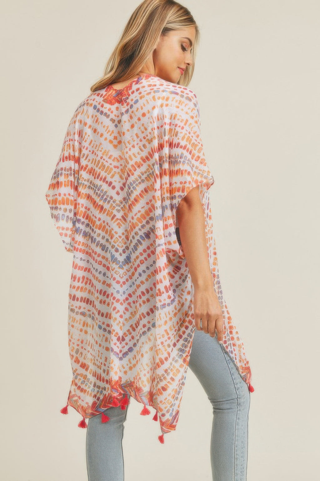 Back of Multi Dash Pattern Tassel Kimono, white with red-orange dashes and fringe hem