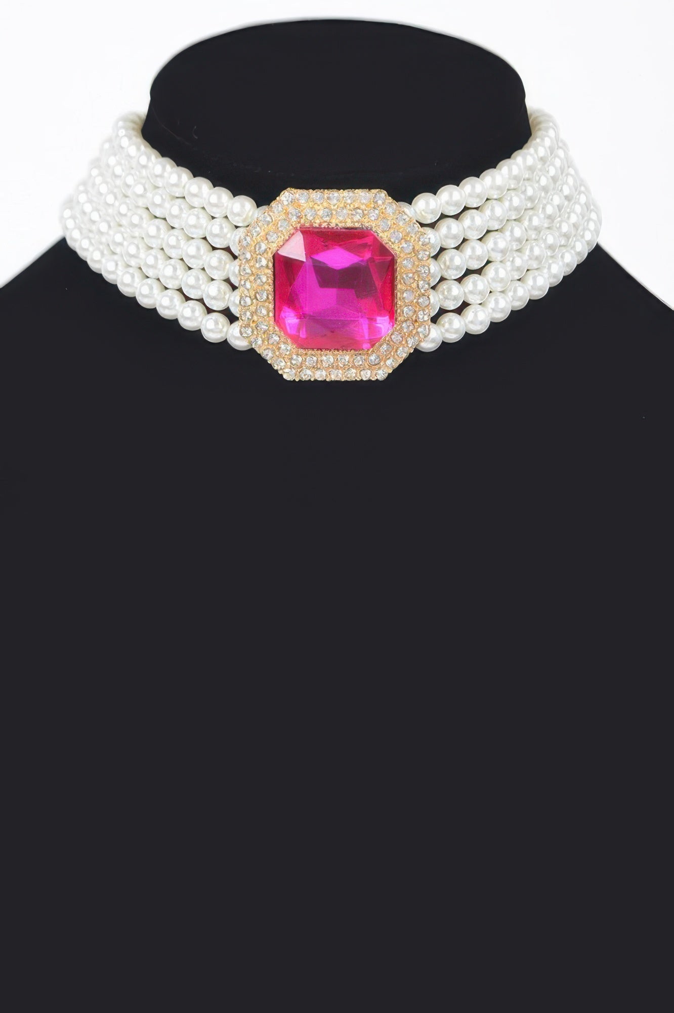 Cream faux pearl multi-row choker with pink gem center and gold-tone frame