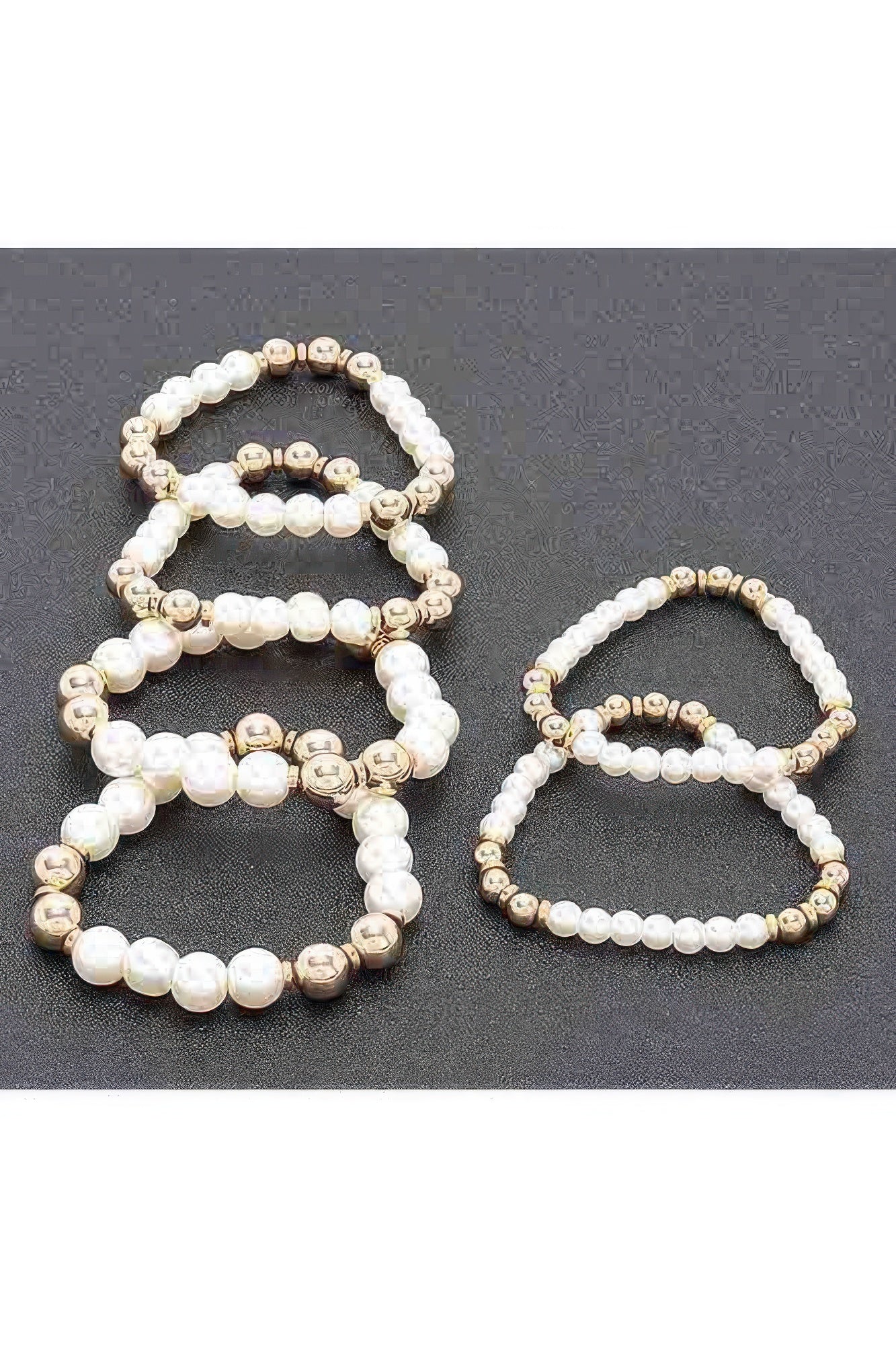 Set of multi faux stretch bracelets: white pearl beads with gold-tone accents